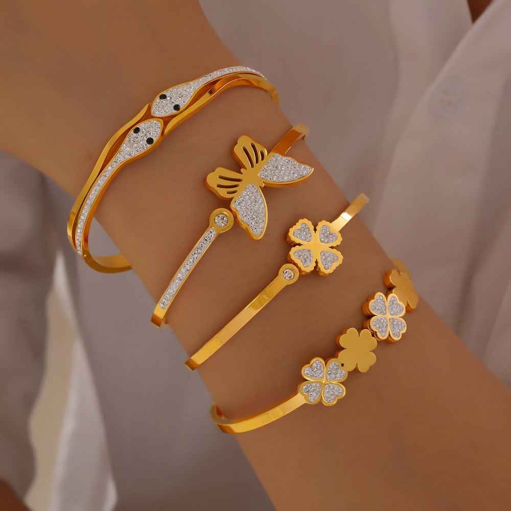 18K Gold Butterfly, Snake & Four-Leaf Clover Diamond Bracelet