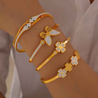 18K Gold Butterfly, Snake & Four-Leaf Clover Diamond Bracelet